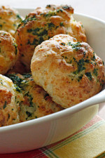 Super easy golden cheddar biscuits drizzled with garlic parsley butter. Make sure you have some company to enjoy these with, or you'll be tempted to eat them all!