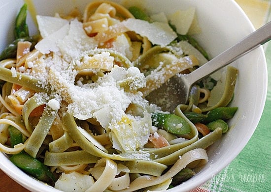 Asparagus poached eggs over linguini