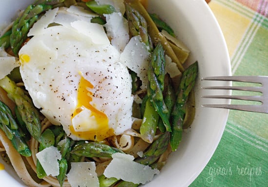 Asparagus poached eggs over pasta tri-color