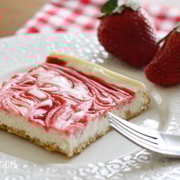 Strawberry Swirl Cheesecake – A low fat cheesecake swirled with strawberry jam on a graham cracker crust.