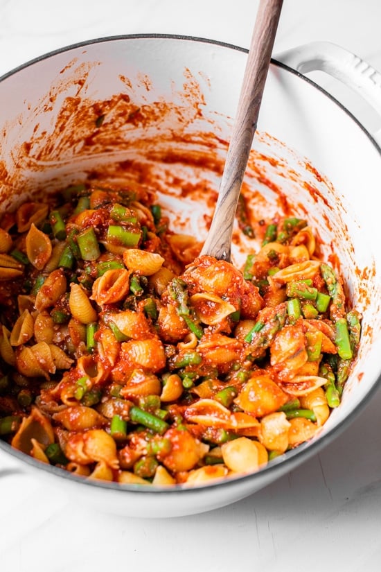 Baby Pasta Shells with Asparagus and Marinara Sauce is a quick and easy 4-ingredient pasta dish, perfect for Spring. Ready in under 15 minutes and under ten dollars to make.