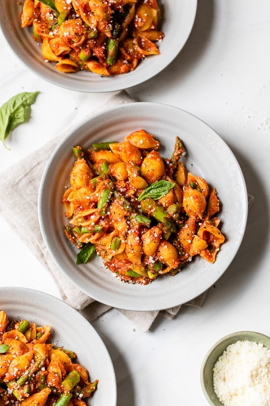 Baby Pasta Shells with Asparagus and Marinara Sauce is a quick and easy 4-ingredient pasta dish, perfect for Spring. Ready in under 15 minutes and under ten dollars to make.