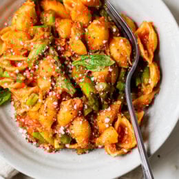 Baby Pasta Shells with Asparagus and Marinara Sauce is a quick and easy 4-ingredient pasta dish, perfect for Spring. Ready in under 15 minutes and under ten dollars to make.