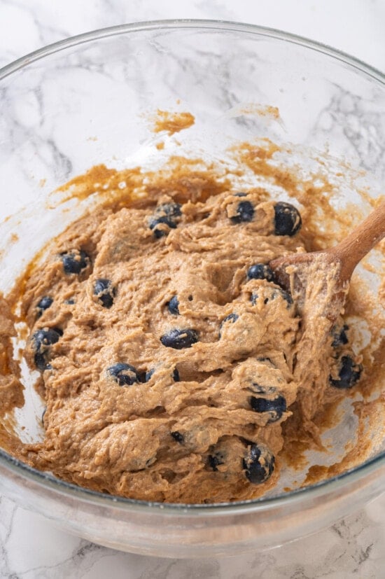 A classic blueberry muffin recipe lightened up with whole wheat flour and applesauce in place of the oil. So moist and delicious! Batter for blueberry muffin recipe