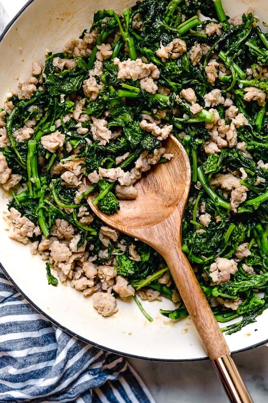 Orecchiette Pasta with Sausage and Broccoli Rabe uses chicken sausage in place of pork and a whole lot of garlic! This lightened up version will not disappoint!!