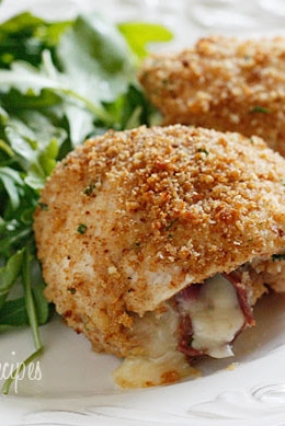 Chicken cutlets dipped in lemon and olive oil, gently coated in a combination of bread crumbs and romano cheese then rolled with prosciutto, cheese and red onion and baked until golden.