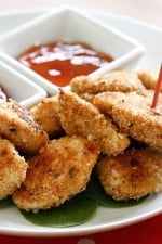 Chunks of chicken breasts coated in breadcrumbs and parmesan cheese then baked until golden. An easy chicken recipe your whole family will love!