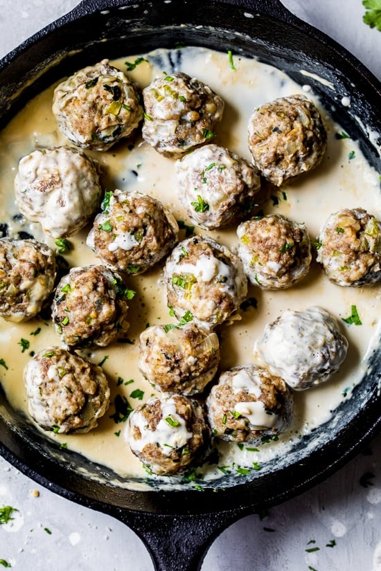 Skillet of creamy Swedish meatballs.
