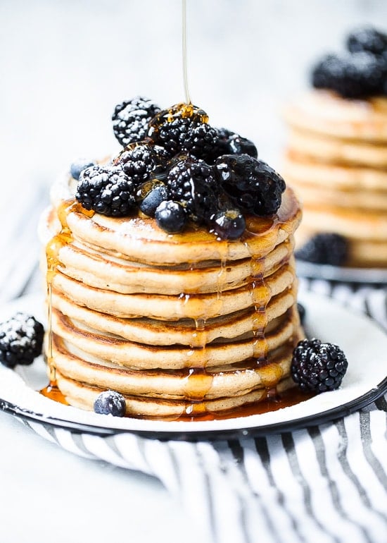 These are the BEST tasting, light and fluffy whole wheat pancakes made from scratch – high in fiber, so they leave you feeling full and satisfied throughout the day.