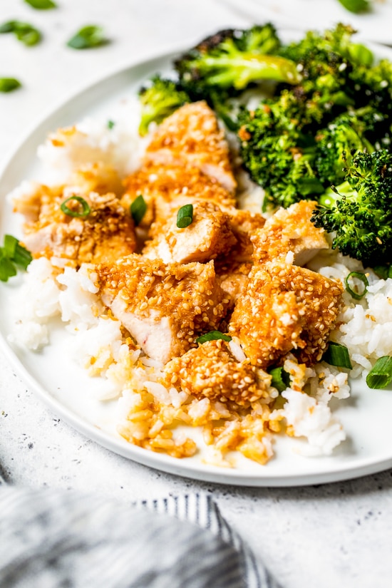If you like the taste of sesame seeds as much as I do, you'll love these Sesame Encrusted Chicken Tenders coated with sesame seeds, panko and a hint of soy sauce. Bake them or make them in the air fryer!