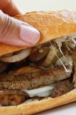 Steak and Cheese Sandwiches with Onions and Mushrooms