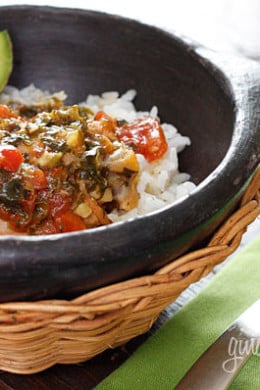 Sofrito Chicken Stew, skinless chicken drumsticks, slowly stewed in light beer, scallions, tomatoes, cilantro, peppers, garlic and spices.