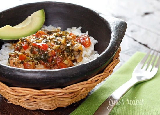 Sofrito Chicken Stew, skinless chicken drumsticks, slowly stewed in light beer, scallions, tomatoes, cilantro, peppers, garlic and spices.