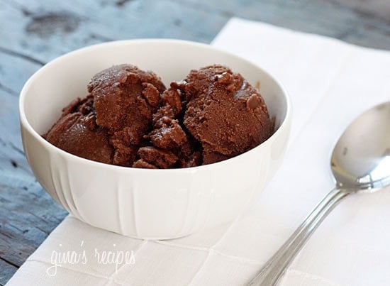 A bowl of chocolate sorbet with a spoon.