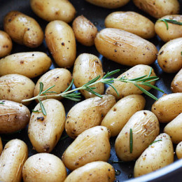 A quick, fabulous side dish made with teeny tiny mini potatoes and fresh garden herbs such as rosemary made on the stove or roasted on the grill. Minimal effort with excellent results.