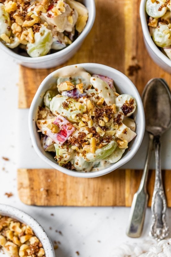 Fall Fruit Salad with apples and grapes in a bowl.