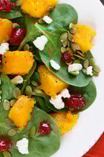 The sweet-salty combination of the roasted butternut squash, dried cherries and gorgonzola cheese along with the slight crunch of the pumpkin seeds topped with a honey dijon vinaigrette will have you savoring every bite of this spinach salad!