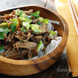 Boneless pork roast slow cooked in Asian spices creates a aromatic pork dish with mushrooms and broth, perfect over noodles or rice with fresh chopped green onions, cilantro and sriracha.