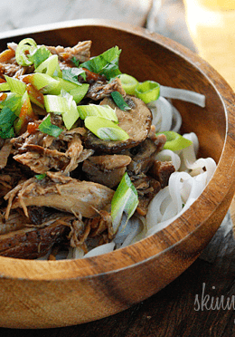 Boneless pork roast slow cooked in Asian spices creates a aromatic pork dish with mushrooms and broth, perfect over noodles or rice with fresh chopped green onions, cilantro and sriracha.