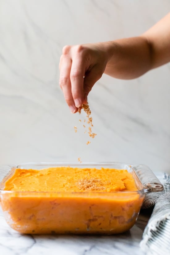 Mashed Sweet Potatoes Brulee are seasoned with with a hint of cinnamon and nutmeg topped with a caramelized brown sugar crust.