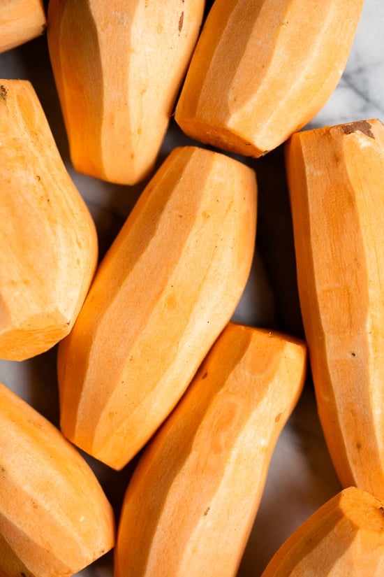 Mashed Sweet Potatoes Brulee are seasoned with with a hint of cinnamon and nutmeg topped with a caramelized brown sugar crust.