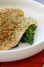 Tilapia filets topped with crushed pumpkin seeds, panko and seasonings, then baked until golden. This is super easy to make and is ready in less than 30 minutes.