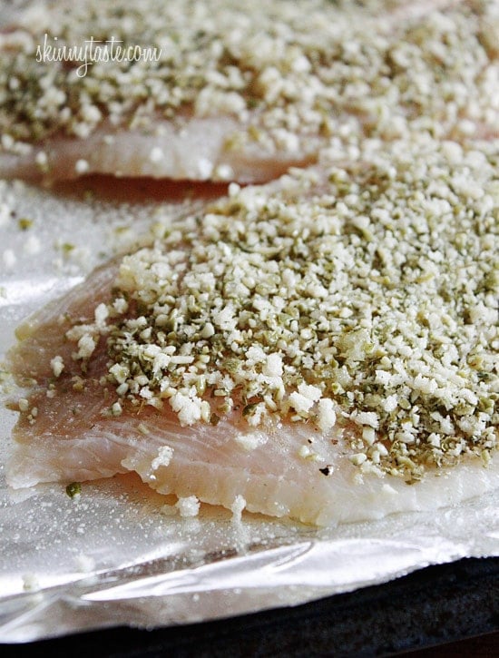 Tilapia filets topped with crushed pumpkin seeds, panko and seasonings, then baked until golden. This is super easy to make and is ready in less than 30 minutes.