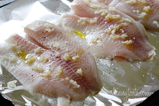 Tilapia filets topped with crushed pumpkin seeds, panko and seasonings, then baked until golden. This is super easy to make and is ready in less than 30 minutes.