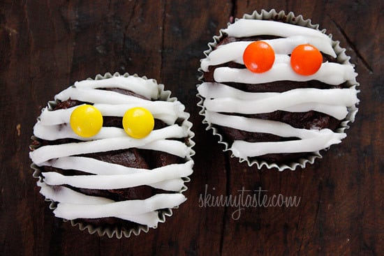 These are healthy Chocolate Mummy cupcakes with vanilla frosting, wouldn't these be so cute to bring to a Halloween party!