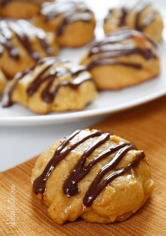 Low-fat pumpkin spice cookies have a cake ball quality to them, drizzled with a chocolate glaze, they are seriously good!