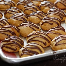 Low-fat pumpkin spice cookies have a cake ball quality to them, drizzled with a chocolate glaze, they are seriously good!