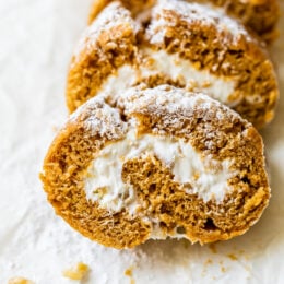 This classic pumpkin roll recipe is made lighter than traditional recipes with a delicious pumpkin spiced sponge cake and a light cream cheese filling.