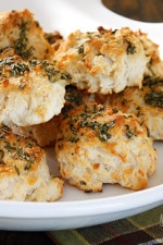 The scent of Garlic + Rosemary + Baked Bread is absolutely intoxicating to me. Seriously, my stomach starts to growl just thinking about it. I've always been more of a savory girl; I can bake a dozen cupcakes and not eat one, but place a batch of these biscuits in front of me... different story.