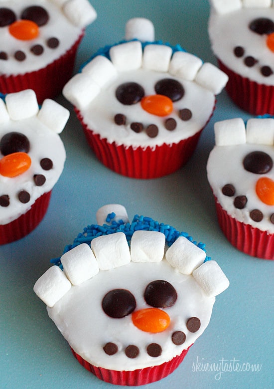 With Christmas just around the corner, these adorable holiday vanilla snowman cupcakes are low fat, easy to make and they are a hit with the kids!