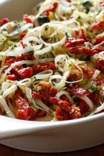 Thin sliced chicken cutlets sauteed in a white wine sauce with leeks and sun-dried tomatoes. Dinner in less than 20 minutes!