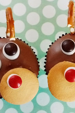 Red velvet yogurt cupcakes topped with a chocolate glaze. These festive reindeer cupcakes are easy to make perfect for a Holiday party!