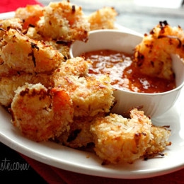 These Easy Baked Coconut Shrimp are crisp, golden and delicious served a sweet and spicy apricot dipping sauce. Set these out on a platter in front of some hungry guests and I guarantee they will disappear!!