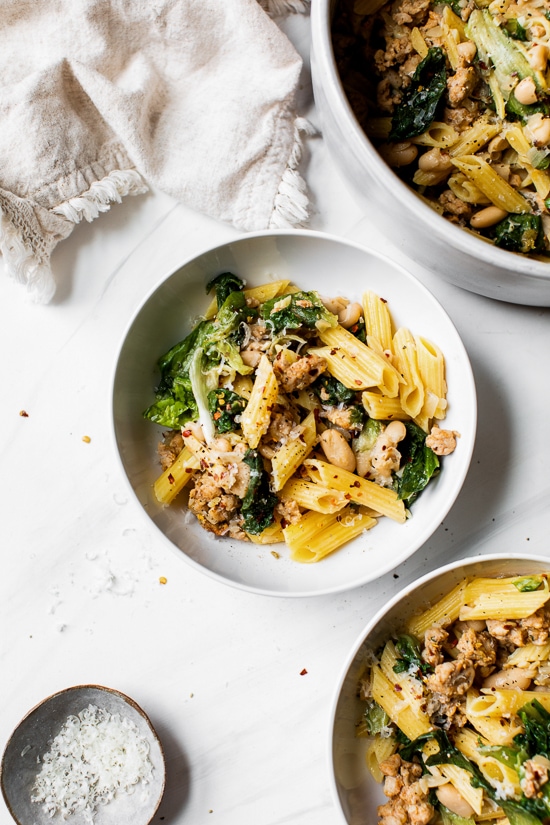 Pasta with Italian Chicken Sausage, Escarole and Beans is ridiculously good made with lots of garlic, lean Italian chicken sausage, and white cannellini beans.