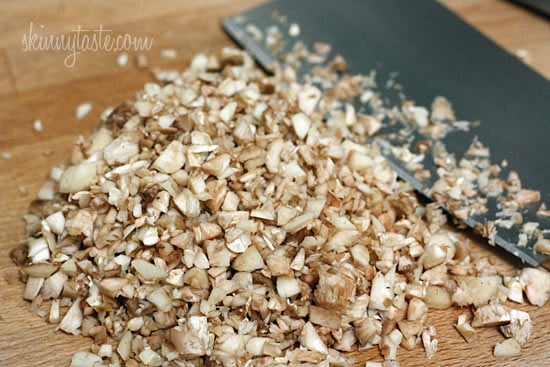 Spinach and Bacon Stuffed Mushrooms stuffed with sautéed baby spinach, chopped mushrooms, bacon, bread crumbs and Parmesan cheese – a lighter alternative to traditional stuffed mushrooms yet loaded with tons of flavor!