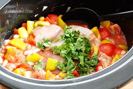 Crock Pot Chicken a la Criolla – In this simple yet flavorful dish, boneless skinless chicken thighs are stewed in the slow cooker with bell peppers, onions, garlic, tomatoes, olives, cilantro and spices. Served over rice.