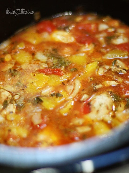 Chicken a la Criolla, a simple yet flavorful Latin dish made with stewed boneless skinless chicken thighs bell peppers, onions, garlic, tomatoes, olives, cilantro and spices.