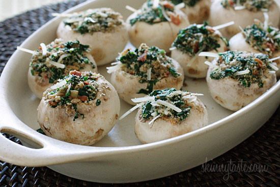 Spinach and Bacon Stuffed Mushrooms stuffed with sautéed baby spinach, chopped mushrooms, bacon, bread crumbs and Parmesan cheese – a lighter alternative to traditional stuffed mushrooms yet loaded with tons of flavor!