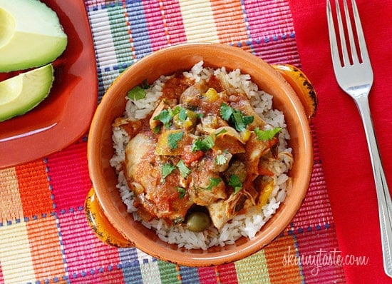 Chicken a la Criolla, a simple yet flavorful Latin dish made with stewed boneless skinless chicken thighs bell peppers, onions, garlic, tomatoes, olives, cilantro and spices.