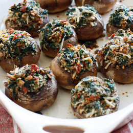 Spinach and Bacon Stuffed Mushrooms stuffed with sautéed baby spinach, chopped mushrooms, bacon, bread crumbs and Parmesan cheese – a lighter alternative to traditional stuffed mushrooms yet loaded with tons of flavor!