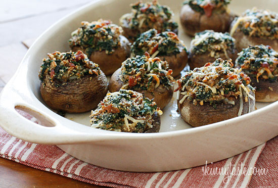 Skinny Spinach and Bacon Stuffed Mushrooms Spinach and Bacon Stuffed Mushrooms stuffed with sautéed baby spinach, chopped mushrooms, bacon, bread crumbs and Parmesan cheese – a lighter alternative to traditional stuffed mushrooms yet loaded with tons of flavor!