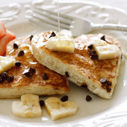 Valentine's Day is coming up and I can't think of a better way to start the morning than with these fabulous light and fluffy Chocolate Chip Banana Pancakes!