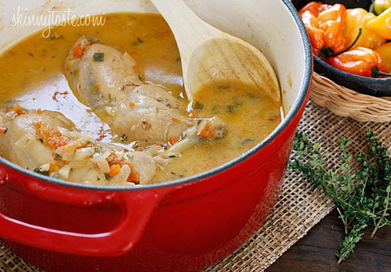 Jamaican Brown Stew Chicken – A spicy dish with skinless chicken legs and thighs, simmered in a pot with light coconut milk, scallions, onions, tomatoes, garlic, thyme and one very hot scotch bonnet pepper.