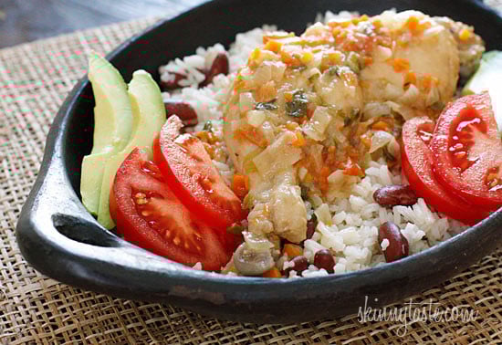 Jamaican Brown Stew Chicken – A spicy dish with skinless chicken legs and thighs, simmered in a pot with light coconut milk, scallions, onions, tomatoes, garlic, thyme and one very hot scotch bonnet pepper.
