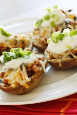 Skinny potato skins loaded Santa Fe style with mildly spiced turkey, black beans, corn and tomatoes topped with cheese - you won't be able to stop at just one!