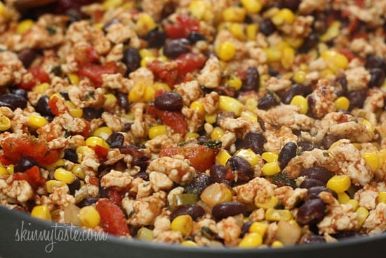 Skinny potato skins loaded Santa Fe style with mildly spiced turkey, black beans, corn and tomatoes topped with cheese - you won't be able to stop at just one!